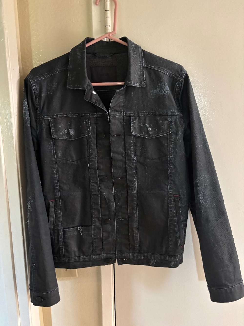 COMUNE distressed wax-coated denim jacket (size S)